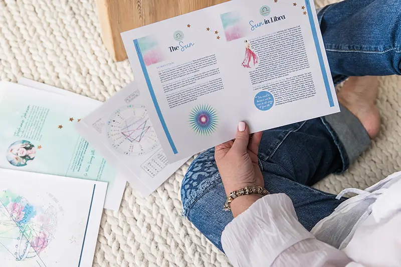 Stephanie Johnson holding Astrology reports image